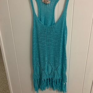 Light blue mesh tank top with fringe at the bottom